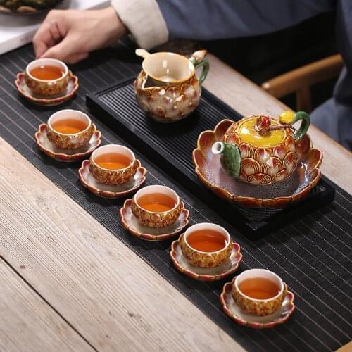 The new ceramic kiln tea set creative embossed lotus Buddha is a cup bowl gift set custom boxes gift gift business home office