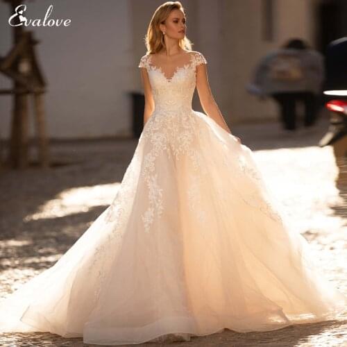 EVALOVE Elegant Scoop Neck Button A-Line Wedding Dresses 2021 Glamorous Cap Sleeve Appliques Court Train Princess Wedding Gown