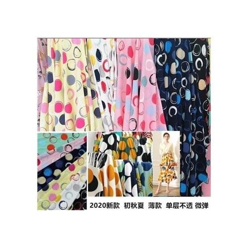 Color dot printed chiffon fabric with elastic spots on all sides