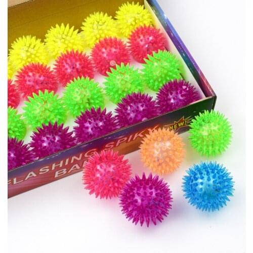 Pet toy 7.5cm luminous sound thorn ball BB is called thorn ball dog teeth cleaning toy