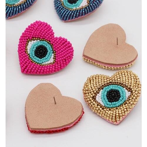 Heart shaped eye studs New fashion temperament crystal heart-shaped eyes personalized earrings travel wild luxury earrings 621