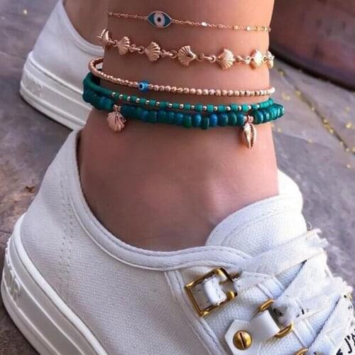 Docona 5pcs Boho Shell Pendant Blue Beaded Anklet Set for Women Multilayer Turkey Evil Eye Elastic Foot Chain Beach Jewelry 8841