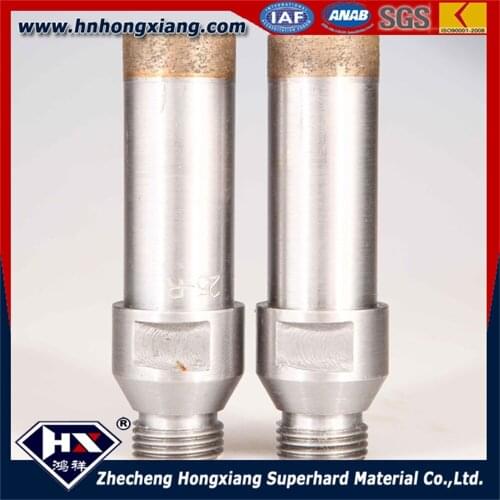 Drilling holes with sintered 49mm diamond thread shank drill bit