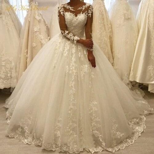 Princess Ball Gown Wedding Dresses Sheer Jewel Neck Illusion Long Sleeves Lace Appliques Bridal Gowns with Sweep Train
