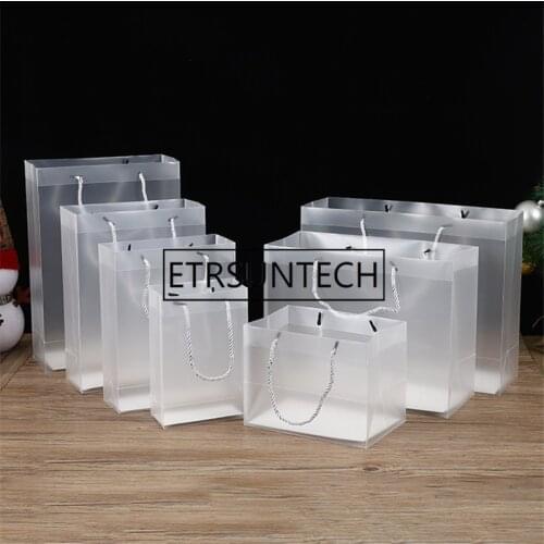 100pcs new creative pp plastic gift packaging bags with handle wedding party favors bags portable plastic transparent gift bags