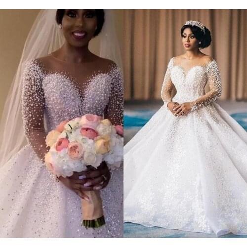 Plus Size Saudi Arabic Sparkly Luxurious Custom Made Wedding Dresses Pearls Crystals Lace Bridal Gowns Sheer Neck Wedding Gown