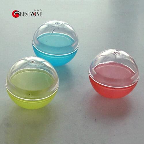 Free shipping 70mm plastic capsule ball half color and half transparent