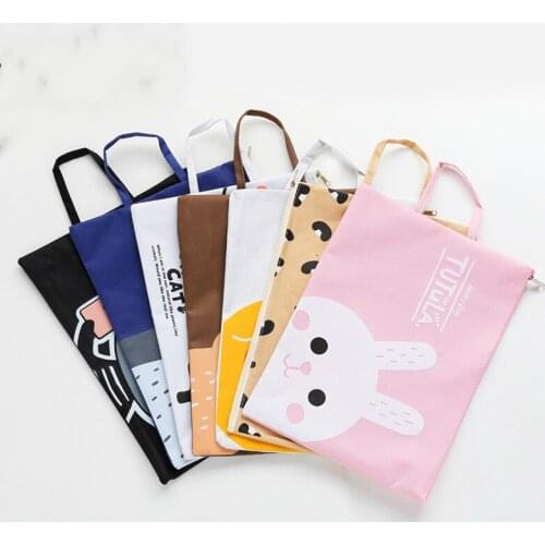 Hot sale1pcs Cartoon Oxford cloth hand receive bag PU Purse /fashion coin storage bag hand take wallet key storage bag Gift bag