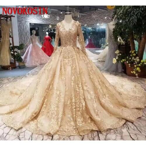Lace Wedding Dresses 2019 Newest Style Champagne V-Neck Long Sleeves Lace Up Back Party Wedding Dress With Shiny Royal Train