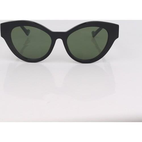 Cat eye green sunglasses women with marble effect temples green lenses