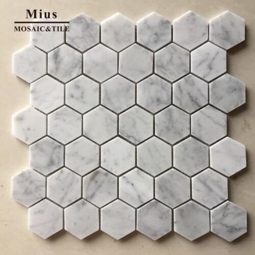 Hexagonal white Carrara tiles marbles in mosaic for bathroom