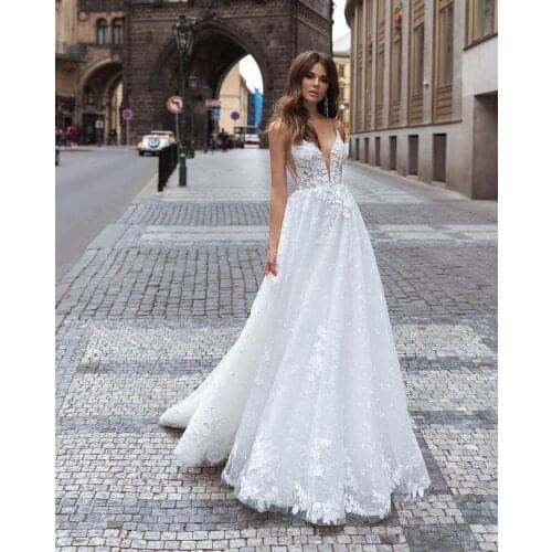 Lace Applique Wedding Dresses Beading Deep V Neck A Line Bridal Gowns Vintage Sleeveless Bride Dress Beach Vestidos De Noiva