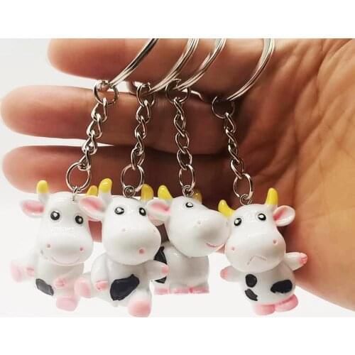 10 pcs Cartoon color cow key chain pendant 3D calf environmental protection resin doll gift for the Year of the Ox