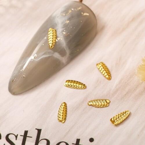 100Pcs Metal Gold Leaf Shaped Nail Art Rhinestones Nail Art Design 3D Charms For Nail Art Decoration Manicure Stickers 3 Sizes