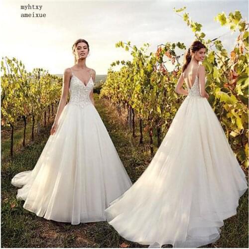 Boho Wedding Dress 2020 Appliqued Sexy Spaghetti Straps Oranza Backless Beach Bride Dress Sexy Wedding Gown Vestido De Noiva