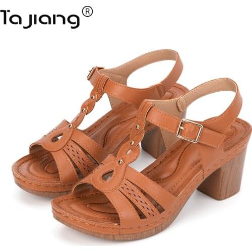 Ta Jiang New thick-soled wedge-heel slippers European and American fashion hollow thick-heeled high-heel slippers T 66059-11