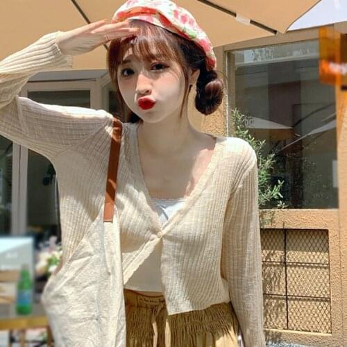Ultra-thin Ice Silk Solid Casual Button Cardigan Female Summer Waves Outside The Sun Taps V-Neck Short Knitting Top