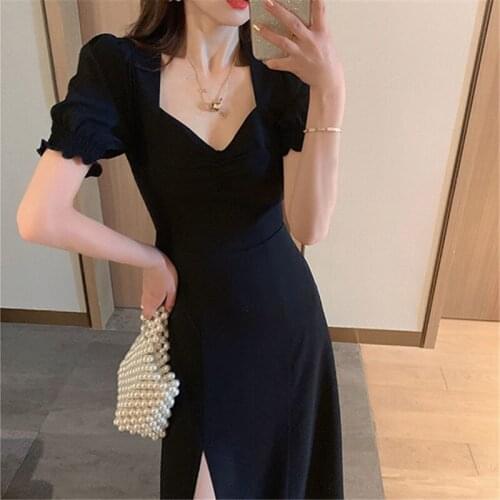 The new summer dress for 2021 is a fat MM large size black dress with slits showing a slim French design sense