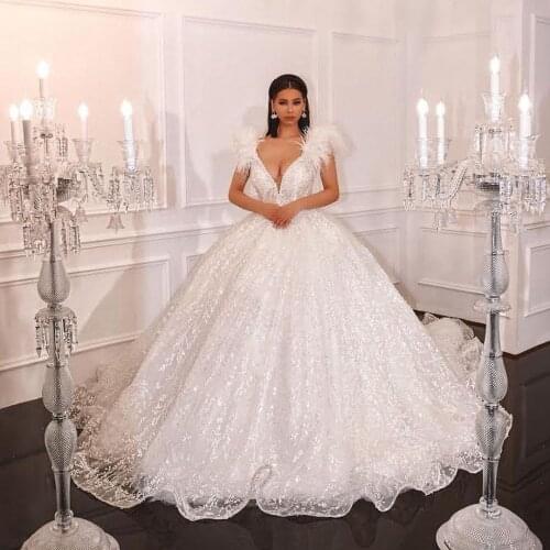 Sexy Deep V-neck Pearls Wedding Dress With Feather Shouler 3D Floral Lace Long Bridal Gowns 2021 Newest Dubai Wedding Gown