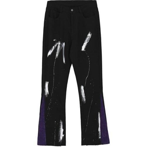 European and American high street wash hand-painted splash ink stitching trousers old burrs, micro-flared slim jeans, trendy men