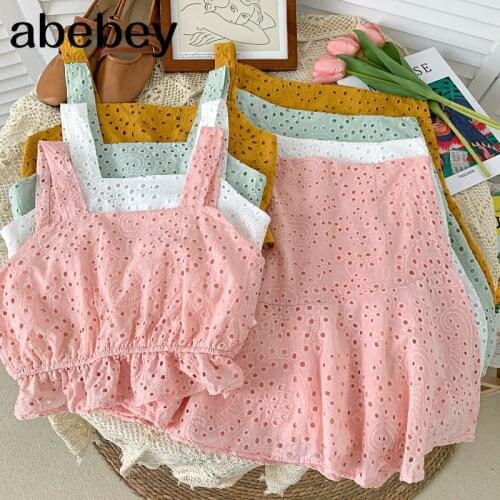 2021 New Summer Fashion All-match Ruffles hollow out short sling Top + high waist slim Skirt two piece set