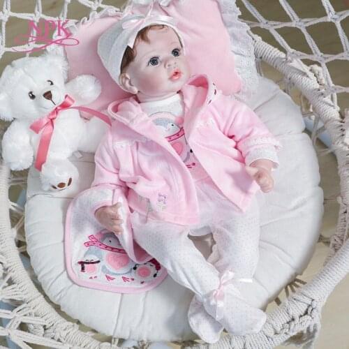 NPK 55CM high quality new design pinky bebe doll reborn baby girl in pink dress set with bear life size baby Christmas Gift