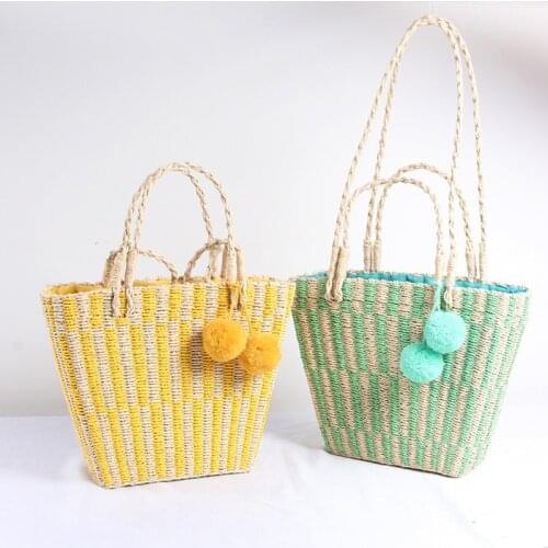 Hand-woven bag womens new Korean version of wool ball straw bag seaside vacation beach hand totes shoulder bag