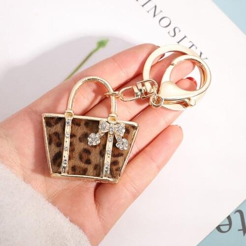 Fashion new key chain jewelry creative leopard small schoolbag shape key chain exquisite car pendant key ring gift female