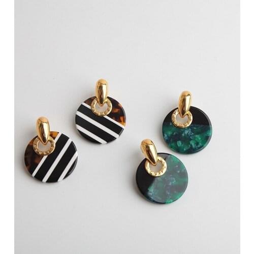 European and American fashion accessories color resin round ear nail fashionable commuting earrings two colors
