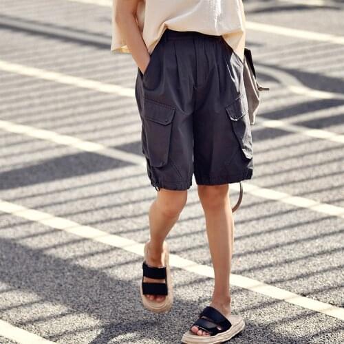 MICOCO K9893C Culture and leisure neutral tooling wind three-dimensional cutting big pocket five - cent lantern shorts