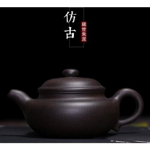 Black clay antique pot pure hand pot purple sand pot wholesale Black Sands teapot King Kong tea set wholesale factory