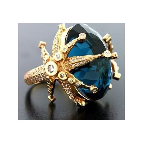 New fashion yellow gold peacock blue stone starfish ring women jewelry European and American luxury banquet engagement ring