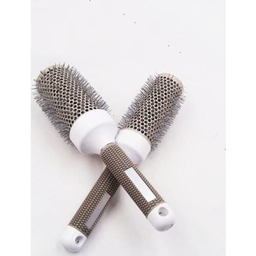 Wholesale curly hair comb pear flower inner buckle head anti-static hairdressing air comb temple hair styling comb iron roller c