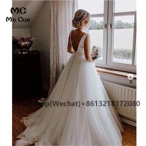 Puffy 2021 A Line Wedding Dresses Simple Crew Neck Covered Button Bow Bridal Gowns Tulle Boho Vestido De Novie
