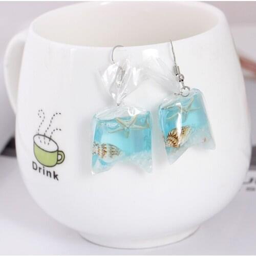 CHUNSHI EMO Creative Transparent Candy Ocean Contracted Wind Conch Earrings Female Personality Resin Flower Plant Earrings