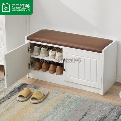 Solid wood shoe changing stool can sit at the door of the home and can accommodate the bench. The shoe wearing stool and Nordic