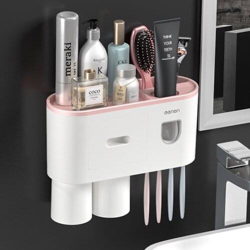 Magnetic adsorption inverted toothbrush holder with dual automatic toothpaste squeezer dispenser storage rack