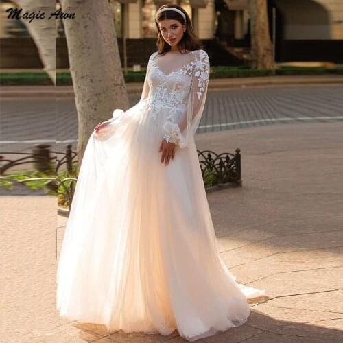 Magic Awn Beach Wedding Dresses 2021 Long Sleeve Lace Appliques Princess Wedding Party Dress Boho Illusion A-Line Abito Da Sposa
