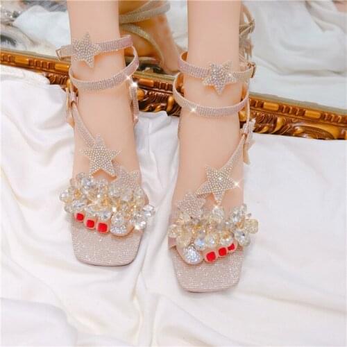 The new summer star sequin crystal fairy shoes have open-toed thick heels