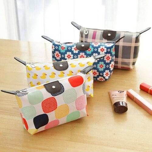 New dumpling cosmetic bag waterproof wash female bag grocery storage bag coin purse folding travel storage bag wholesale