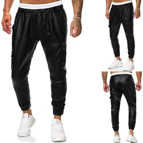 Autumn and winter new European and American mens solid color thickened leisure locomotive elastic leather pants mens pants