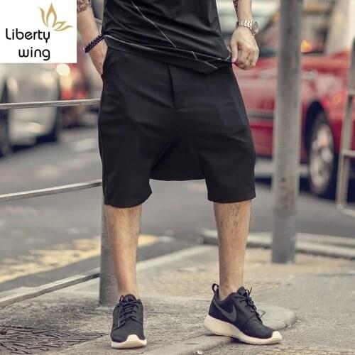 Summer Mens Baggy Multi Pocket Cargo Straight Breeches Male Loose Hot Pants Plus Size 4XL High Street Black Harem Shorts