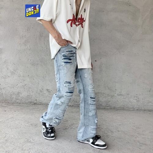 UNCLEDONJM High Street ripped jeans hip hop jeans Pleated Flare Pants hip hop jeans for men 2021 kpop clothes denim jeans E083