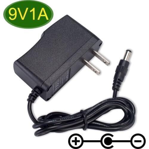 1PCS 9V1A AC 100V-240V Converter Switching Power Adapter DC 9V 1A 1000mA Universla Power Supply Reverse Polarity Negative Inside