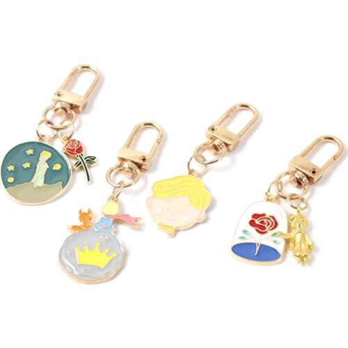 Lovely Rose Boy Little Prince Pendant Key Chain Little Fox Planet Universe Keychains AirPods Earphone Pendant Key Ring