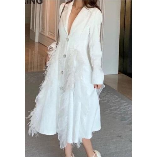 Yuerwang Women Coat Winter Long White Feather Coat Temperament Spliced lady Overcoat Lotus Leaf Single Breasted Slim Thin 2021