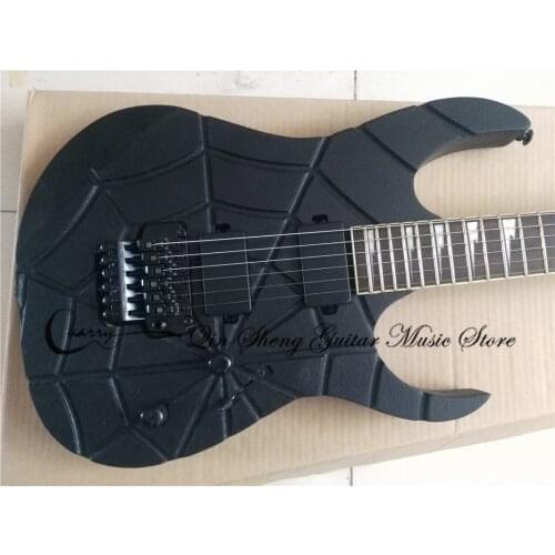 Free shipping custom in advance electric guitar,matte black high quality guitar,tremolo bridge,Carve relief body,black buttons