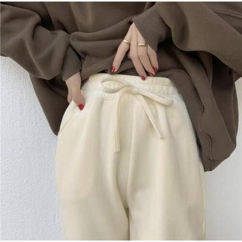 2021 autumn and winter vertical stripes plus velvet womens three-color tapered harem pants fashion casual solid color pants