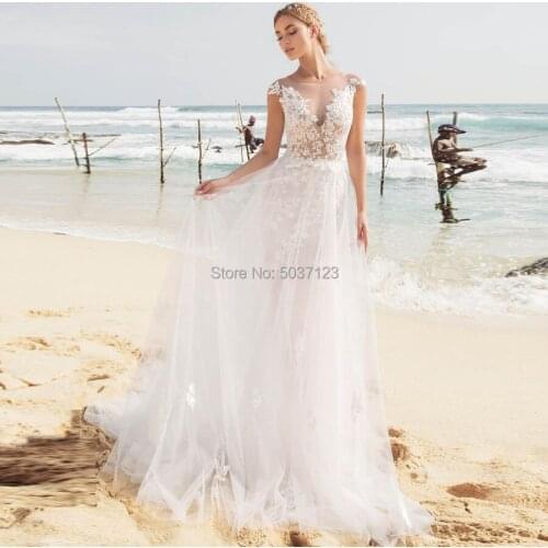 Beach Wedding Dresses Mermaid Lace Appliques Cap Sleeves Sleeveless Open Back Illusion Bridal Wedding Gowns Vestido De Noiva