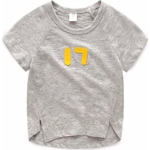 2015 summer new hot sale children t shirts Korean wild figure 17 # slashed loose cotton T-shirt for boys clothes girls t-shirts